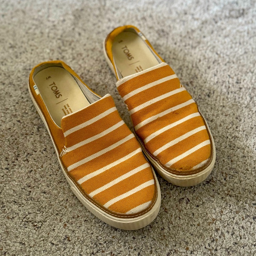 TOMS mustard striped slip ons